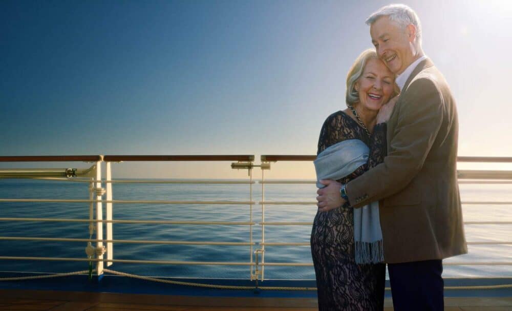 Mature-couple-evening-embracing-cruise-ship-lifestyle-photography