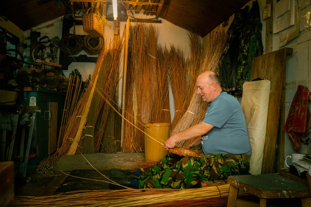 Chris Sat Weaving A Basket In His Workshop.Chris Beck Willow Weaver Somerset