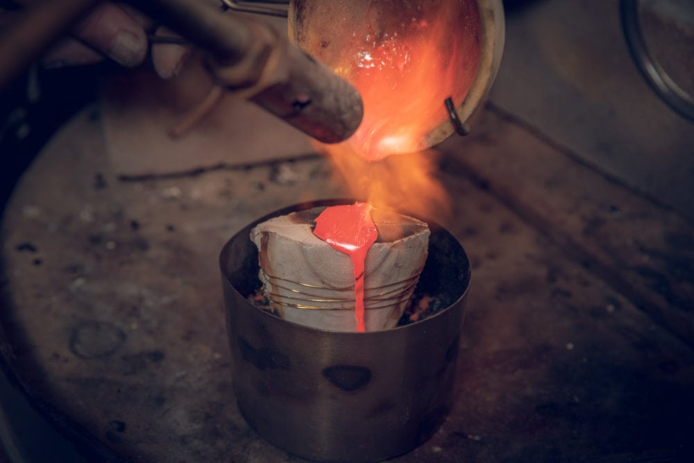 Cat Mills Pouring Molten Silver Into Cuttlefish Mould